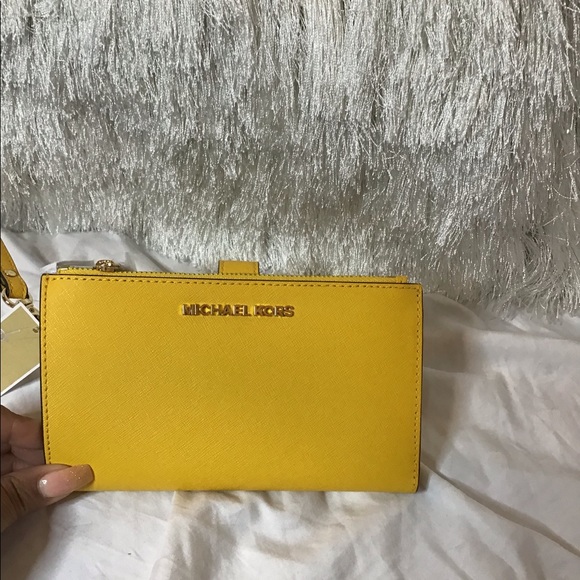 Michael Kors Handbags - MK yellow jet set double zip wallet